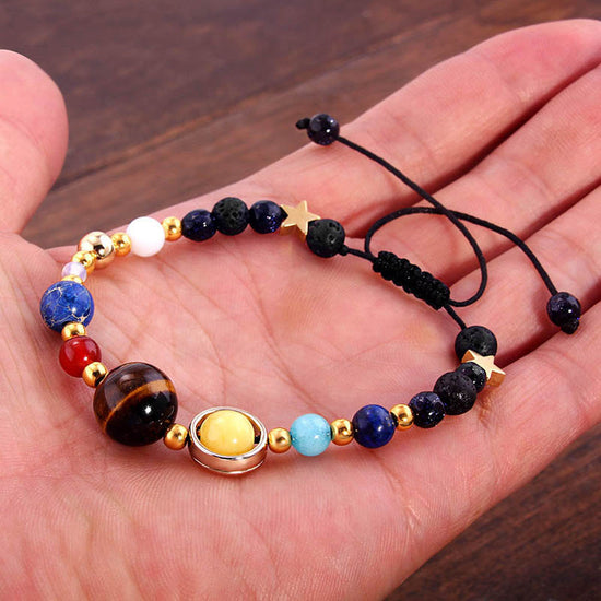 Image Title Solar System Charm Bracelet Hand